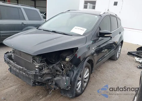 2017 Ford Escape Titanium z USA, uszkodzony, nr VIN 1FMCU0JD1HUC94365